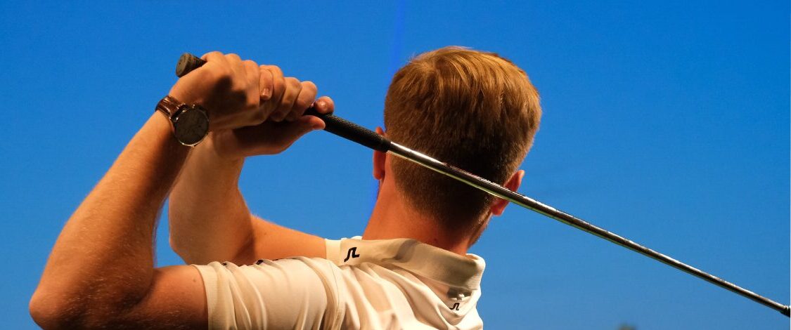 PGA Professional golf swing during a lesson demonstration